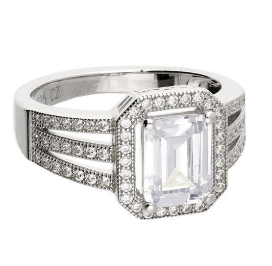 Vintage-style rectangular emerald cut cubic zirconia. 3 split shank